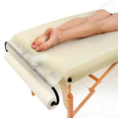 A cama cabida descartável perfurada não tecida estéril dos termas do absorvente cobre o rolo para a tabela da massagem